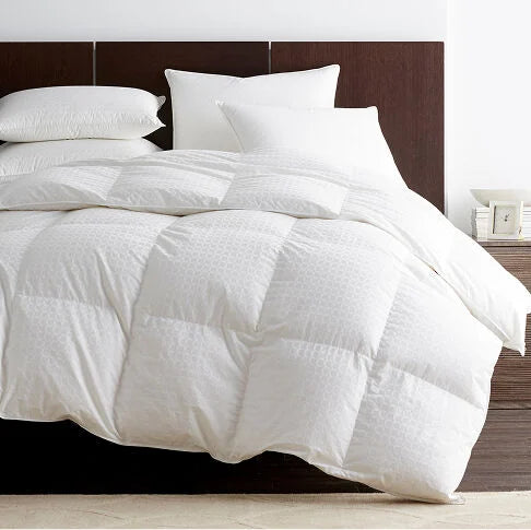 Down comforter on a bed